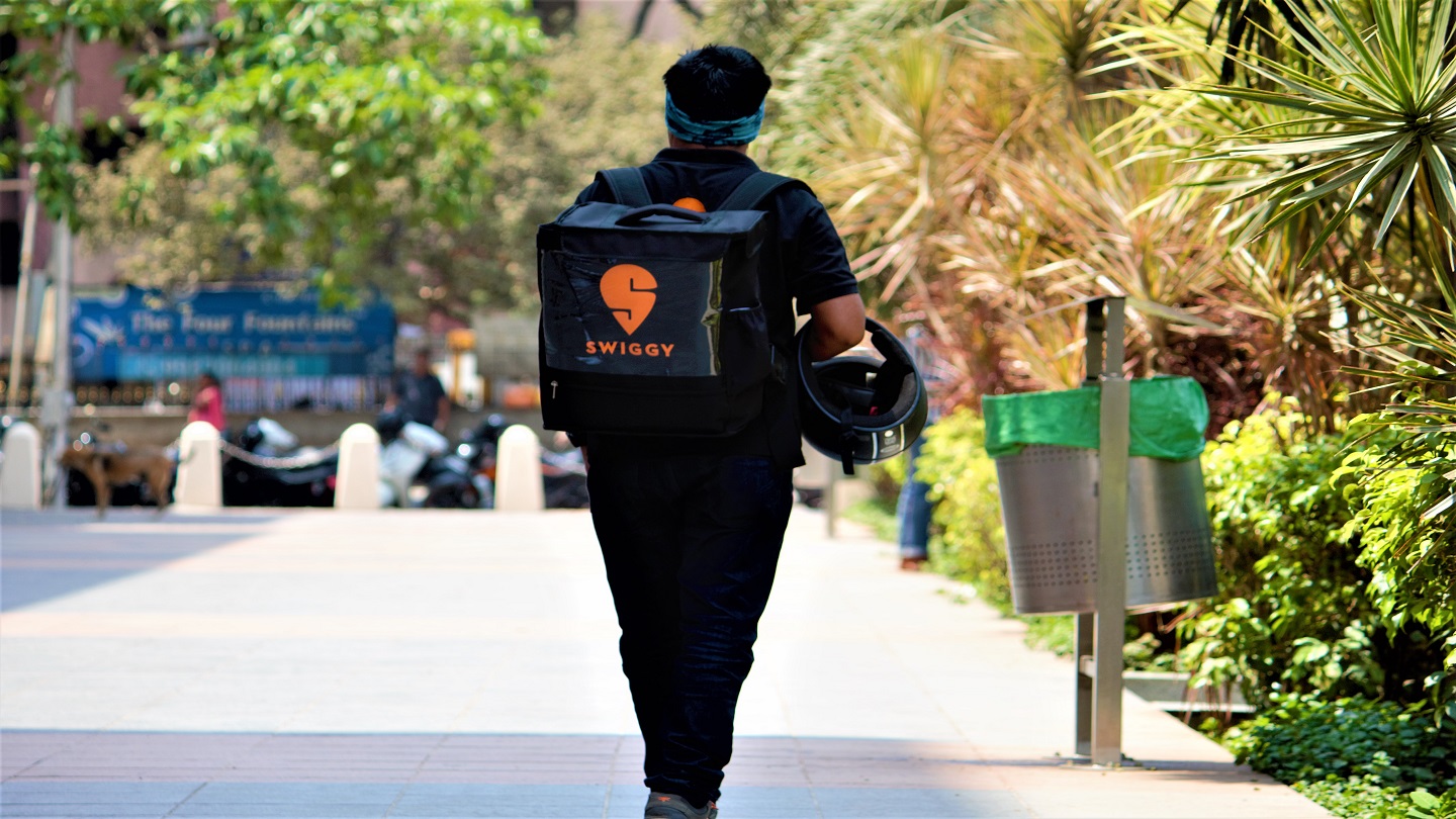 Photo of burqa-clad woman carrying a Swiggy bag goes viral: Here's the  truth behind the image - BusinessToday